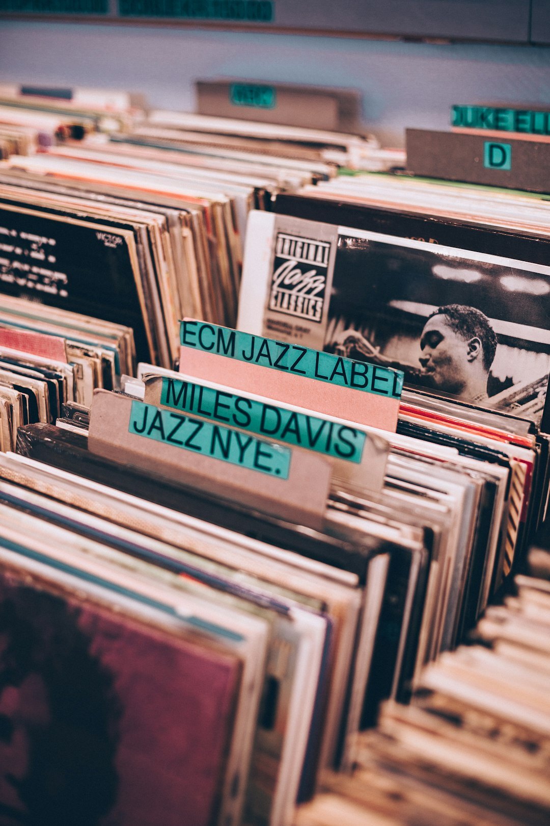 Close-up of a vintage record player and jazz records