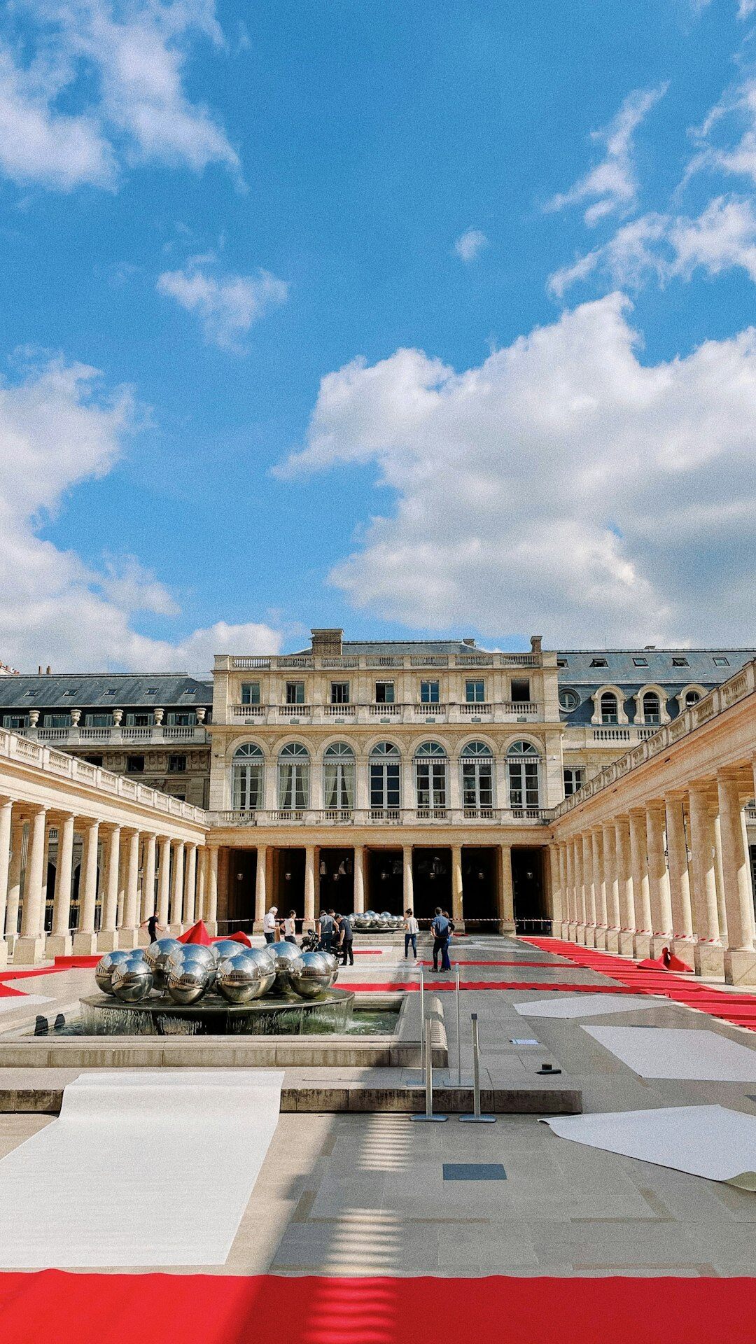 Grand red carpet event entrance with classic architecture